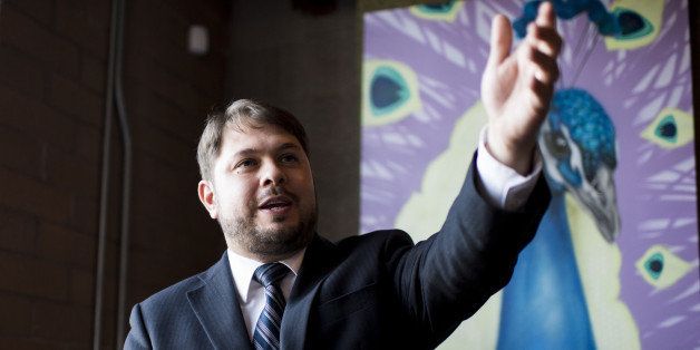 UNITED STATES - AUGUST 8: Ruben Gallego, Democratic candidate for the 7th Congressional district in Arizona, speaks during a fundraiser at the Pizza People Pub in Phoenix on Thursday, Aug. 8, 2014. (Photo By Bill Clark/CQ Roll Call)