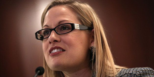 WASHINGTON, DC - OCTOBER 23: U.S. Rep. Kyrsten Sinema (D-AZ) speaks during a discussion on immigration reform October 23, 2013 on Capitol Hill in Washington, DC. The Dream Action Coalition held a rally and briefing to discuss 'how the outdated immigration system undermines military readiness, separates military families, and prevents talent from joining its enlisted and officer ranks.' (Photo by Alex Wong/Getty Images)