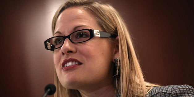 WASHINGTON, DC - OCTOBER 23: U.S. Rep. Kyrsten Sinema (D-AZ) speaks during a discussion on immigration reform October 23, 20