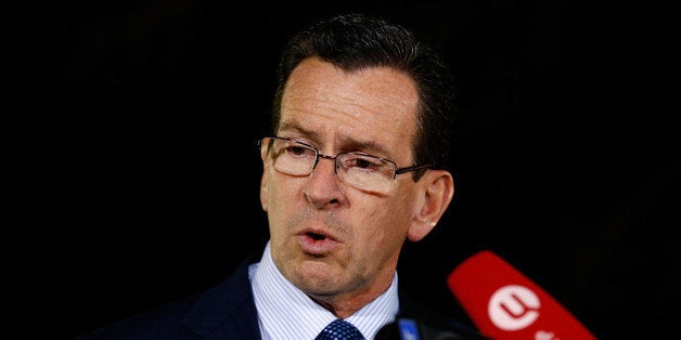 NEWTOWN, CT - DECEMBER 14: Connecticut Governor Dan Malloy gives a statement about the elementary school shooting during a pr