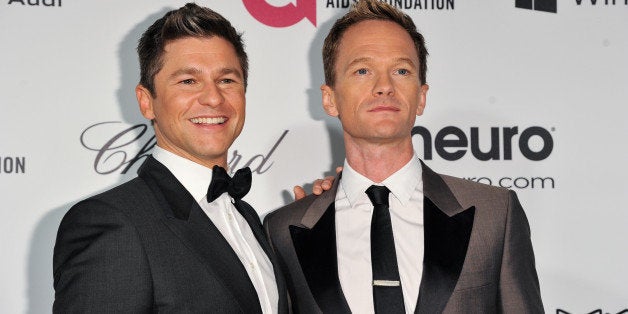 Neil Patrick Harris, right, and David Burtka arrive at 2014 Elton John Oscar Viewing and After Party Mar. 2, 2014 in West Hollywood, Calif. (Photo by Richard Shotwell/Invision/AP)