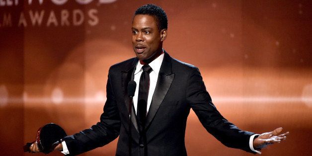 HOLLYWOOD, CA - NOVEMBER 14: Actor-comedian Chris Rock accepts the Hollywood Comedy Film Award for 'Top Five' onstage during the 18th Annual Hollywood Film Awards at The Palladium on November 14, 2014 in Hollywood, California. (Photo by Kevin Winter/Getty Images)