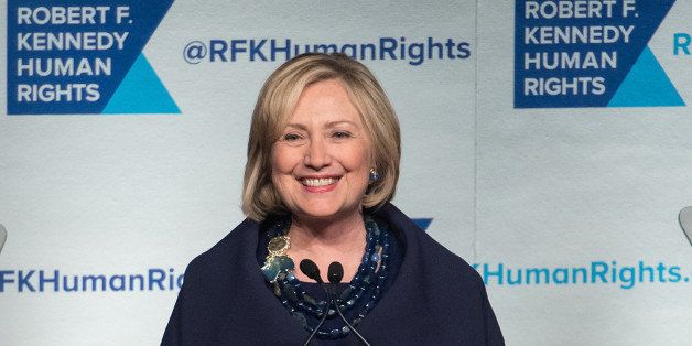 NEW YORK, NY - DECEMBER 16: Event honoree Hillary Rodham Clinton speaks on stage during the 2014 Robert F. Kennedy Ripple Of Hope Awards at the New York Hilton on December 16, 2014 in New York City. (Photo by Mike Pont/FilmMagic)