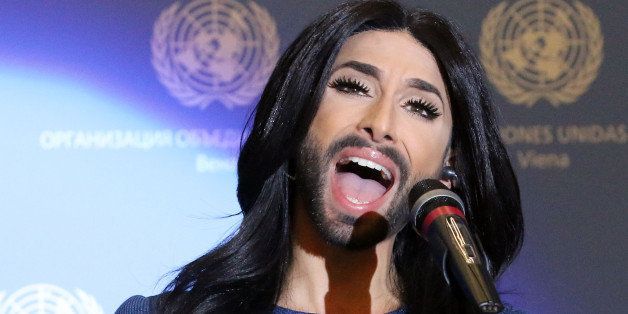 Austrian singer and Eurovision Song Contest winner Conchita Wurst performs on stage during U.N. Secretary-General Ban Ki-moon's visit to the United Nations in Vienna at the International Center in Vienna, Austria, Monday, Nov. 3, 2014. (AP Photo/Ronald Zak)