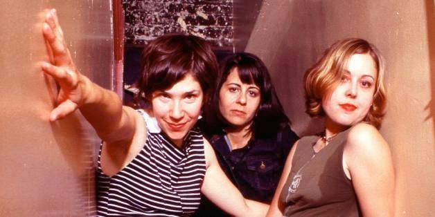 Portrait of Sleater-Kinney (L-R) Carrie Brownstein, Janet Weiss, Corin Tucker, backstage at The Fillmore in San Francisco, California, USA on 23rd September 2002. (Photo by Anthony Pidgeon/Redferns)