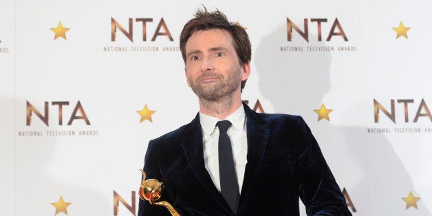 LONDON, ENGLAND - JANUARY 21: David Tennant, winner of the Special Recognition award, poses in the winners room at the National Television Awards at 02 Arena on January 21, 2015 in London, England. (Photo by David M. Benett/Getty Images)