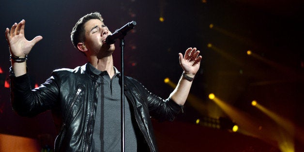 Nick Jonas performs at the KIIS FM's Jingle Ball at the Staples Center on Friday, Dec. 5, 2014, in Los Angeles. (Photo by John Shearer/Invision/AP)