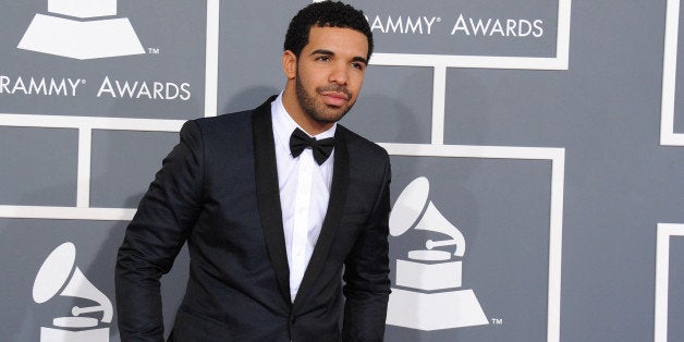 Rapper Drake arrives at the 55th annual Grammy Awards on Sunday, Feb. 10, 2013, in Los Angeles. (Photo by Jordan Strauss/Invision/AP)