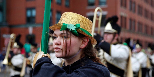 BOSTON - MARCH 15: A member of the Lapel High School Marching Band and Guard marches during the St. Patrick's Day Parade in t