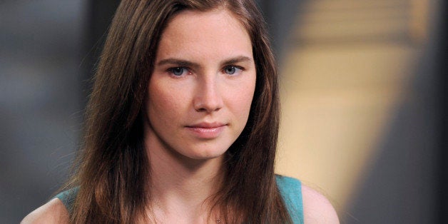 This April 9, 2013 photo released by ABC shows Amanda Knox, left, speaking during a taped interview with ABC News' Diane Sawy