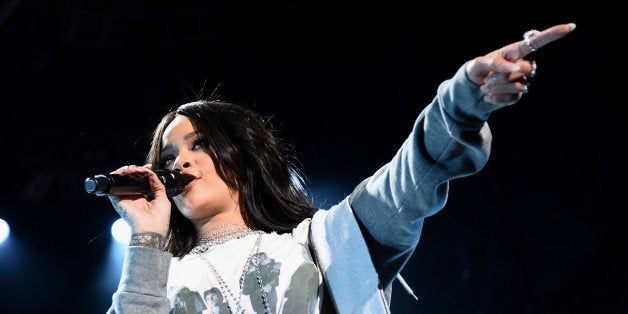 INDIANAPOLIS, IN - APRIL 04: Rihanna performs onstage during the Coke Zero Countdown at the NCAA March Madness Music Festival - Day 2 at White River State Park on April 4, 2015 in Indianapolis, Indiana. (Photo by Michael Loccisano/Getty Images for Turner)