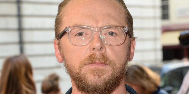 LONDON, ENGLAND - MAY 13: (SUN NEWSPAPER OUT. MANDATORY CREDIT PHOTO BY DAVE J. HOGAN GETTY IMAGES REQUIRED) Simon Pegg atte