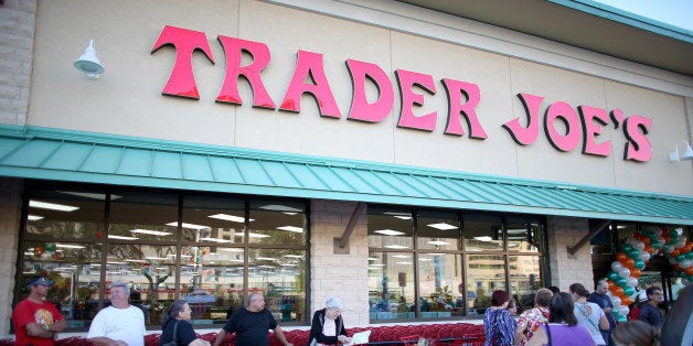 PINECREST, FL - OCTOBER 18: Shoppers lineup as they wait for the grand opening of a Trader Joe's on October 18, 2013 in Pinecrest, Florida. Trader Joe's opened its first store in South Florida where shoppers can now take advantage of the California grocery chains low-cost wines and unique items not found in other stores. About 80 percent of what they sell is under the Trader Joe's private label. (Photo by Joe Raedle/Getty Images)