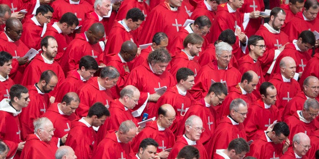 Prelates attend a Pentecost Mass , in St. Peter's Square at the Vatican, Sunday, May 19, 2013. (AP Photo/Andrew Medichini)