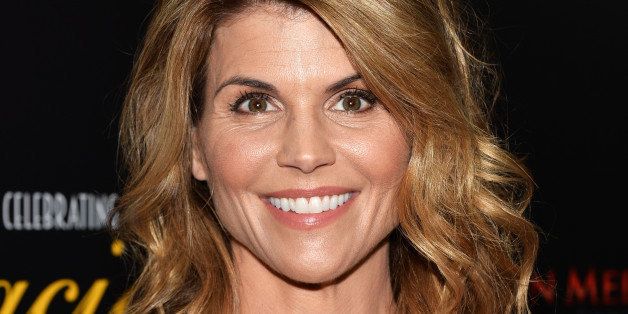 BEVERLY HILLS, CA - MAY 19: Actress Lori Loughlin arrives at the 40th Anniversary Gracies Awards at The Beverly Hilton Hotel on May 19, 2015 in Beverly Hills, California. (Photo by Amanda Edwards/WireImage)