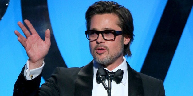 LOS ANGELES, CA - JANUARY 24: Actor/producer Brad Pitt accepts the PGA Visionary Award onstage during the 26th Annual Producers Guild Of America Awards at the Hyatt Regency Century Plaza on January 24, 2015 in Los Angeles, California. (Photo by Mark Davis/Getty Images)