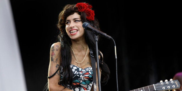 British singer, Amy Winehouse performs at the V Festival, near Chelmsford, England, Sunday, Aug. 17, 2008, after which, accor