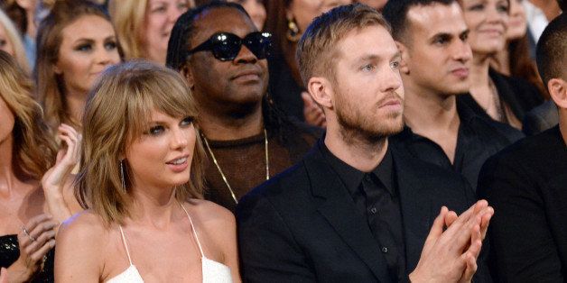LAS VEGAS, NV - MAY 17: Singer Taylor Swift (L) and DJ Calvin Harris attend the 2015 Billboard Music Awards at MGM Grand Garden Arena on May 17, 2015 in Las Vegas, Nevada. (Photo by Jeff Kravitz/BMA2015/FilmMagic)