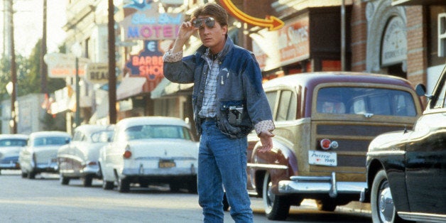 Michael J Fox walking across the street in a scene from the film 'Back To The Future', 1985. (Photo by Universal/Getty Images)