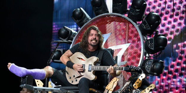 The Foo Fighters' Dave Grohl performs at RFK Stadium on Saturday, July 4, 2015, in Washington. (Photo by Nick Wass/Invision/AP)