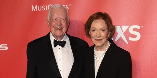 President Jimmy Carter, left, and Rosalynn Carter arrive at the 2015 MusiCares Person of the Year event at the Los Angeles Convention Center on Friday, Feb. 6, 2015 in Los Angeles. (Photo by Richard Shotwell/Invision/AP)