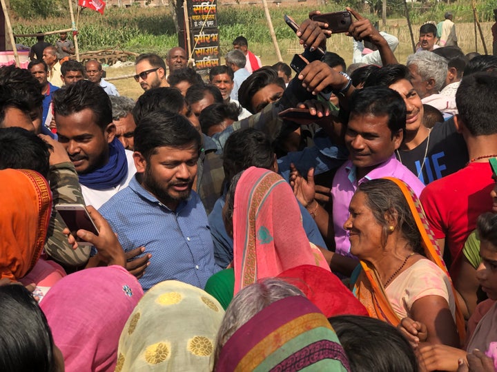 Kanhaiya surrounded by villagers during his campaign