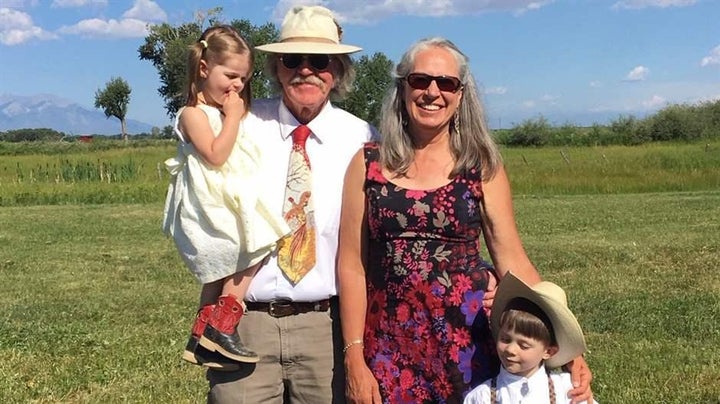 Thad Elliott, his wife, Deanne, and their grandchildren, Olivia and Elijah. Like many farmers across the country, Elliott is