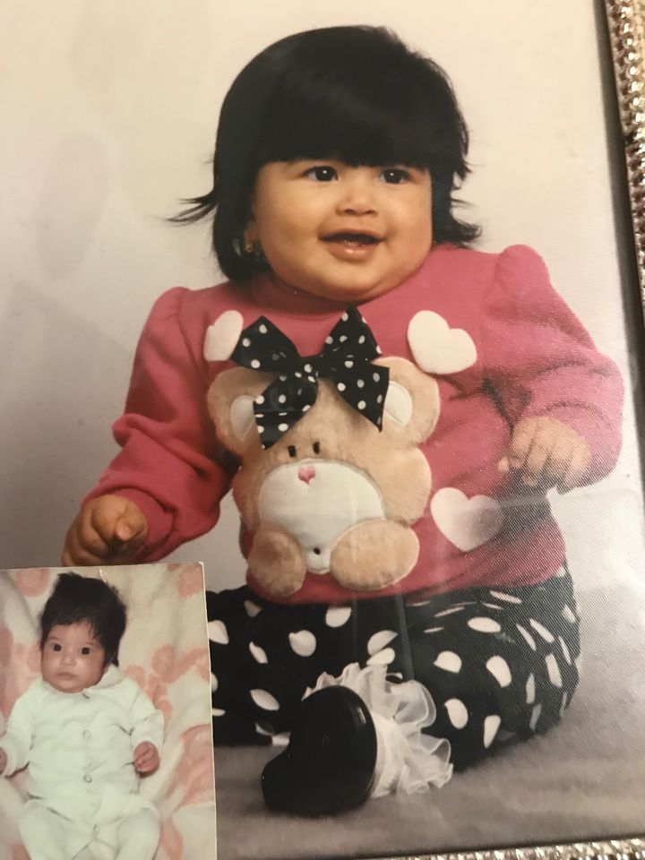 I was about 7 months old in this photo and had been living with my parents for a while in the U.S. This picture lives in my parents' living room in a large frame.