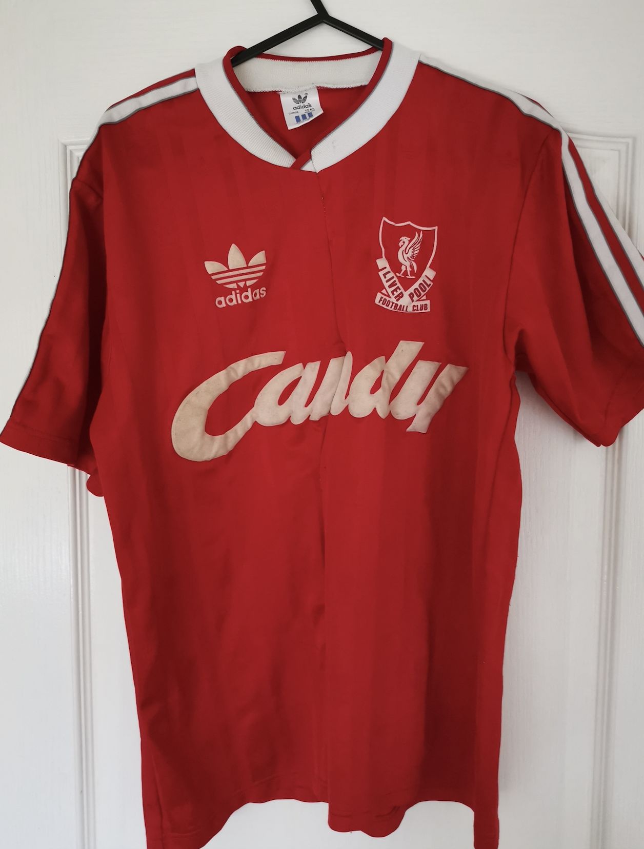 The Hillsborough shirt that was cut off Mark Aspden by doctors as they battled to save his life. His aunt later stitched it back together.