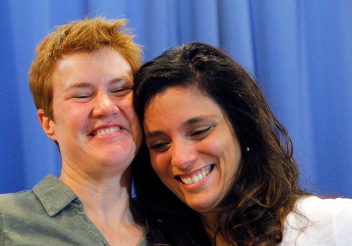Val Tanco (right) and Sophie Jesty smile during a news conference in Knoxville, Tennessee, on June 26, 2015. They were a
