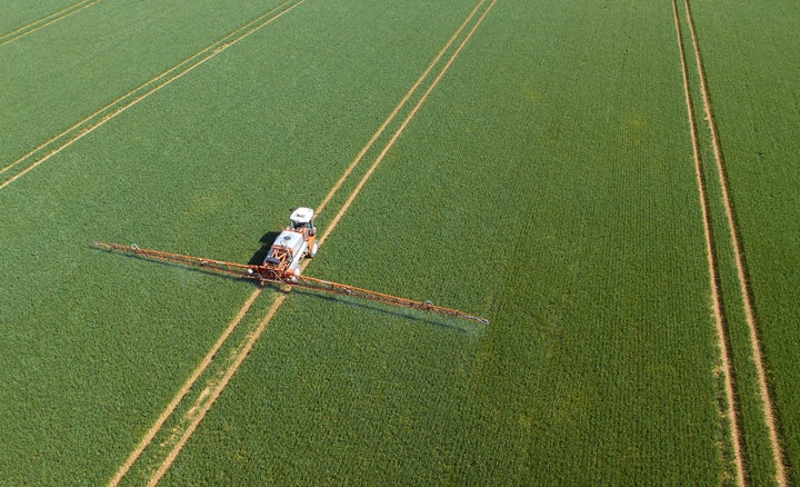 Pesticides being sprayed on crops. 