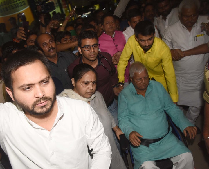 Tejashwi with his father Lalu Yadav, elder sister Misa Bharati and elder brother Tej Pratap in a file photo