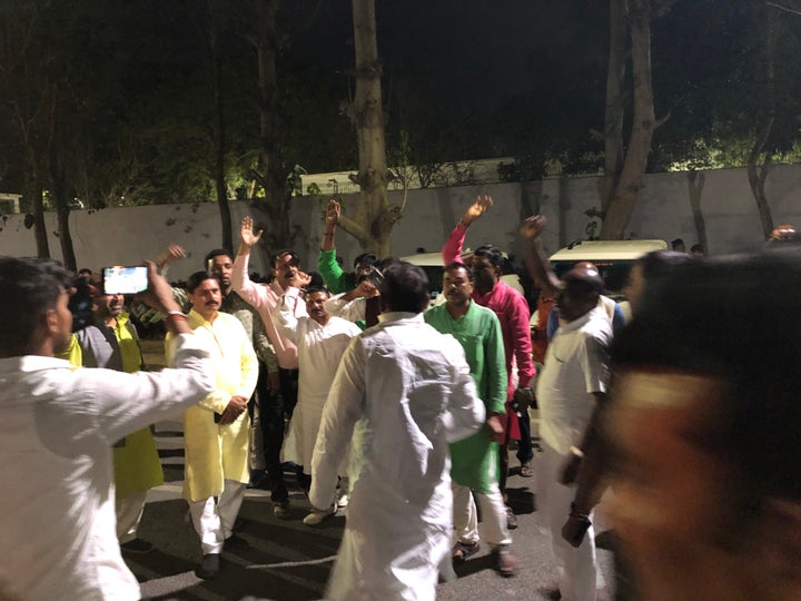 RJD workers protesting in front of Lalu Prasad Yadav's home in Patna over ticket distribution.