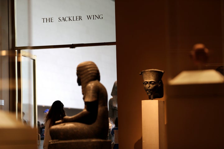 A sign with the Sackler name is displayed at the Metropolitan Museum of Art in New York. The Sackler name adorns walls at som