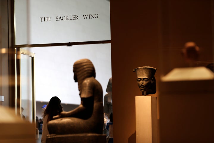 A sign with the Sackler name is displayed at the Metropolitan Museum of Art in New York. The Sackler name adorns walls at some of the world's top museums and universities, but the family's ties to OxyContin are bringing a new kind of attention to the Sacklers and their philanthropic legacy.