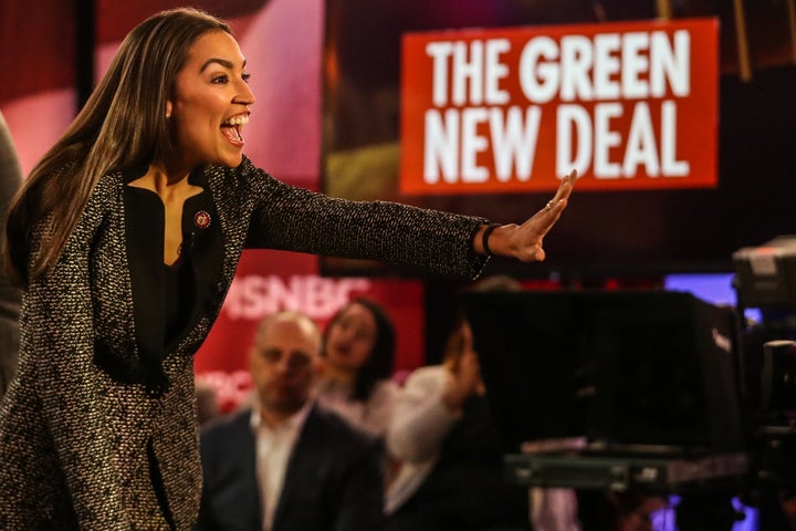 Rep. Alexandria Ocasio-Cortez (D-N.Y.) waves at an enthusiastic crowd of hometown supporters, half of whom raised their hands when MSNBC host Chris Hayes, a fellow Bronx native, asked who was from the borough.