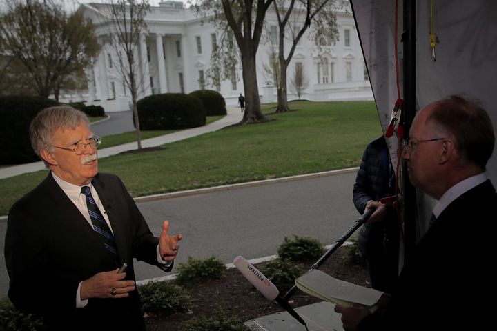 John Bolton speaks during an interview at the White House in Washington, 29 March.