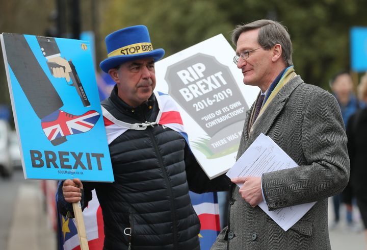 Dominic Grieve MP is confronted by anti-Brexit campaigner Steve Bray on his way to the Houses of Parliament in Westminster earlier this week.