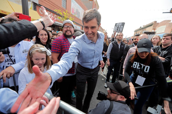 Democratic presidential candidate and former Texas congressman Beto O'Rourke greets supporters as he arrives at his president