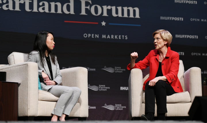 HuffPost Washington bureau chief Amanda Terkel, left, listens as Sen. Elizabeth Warren (D-Mass.) answers a question during Saturday's Heartland Forum.