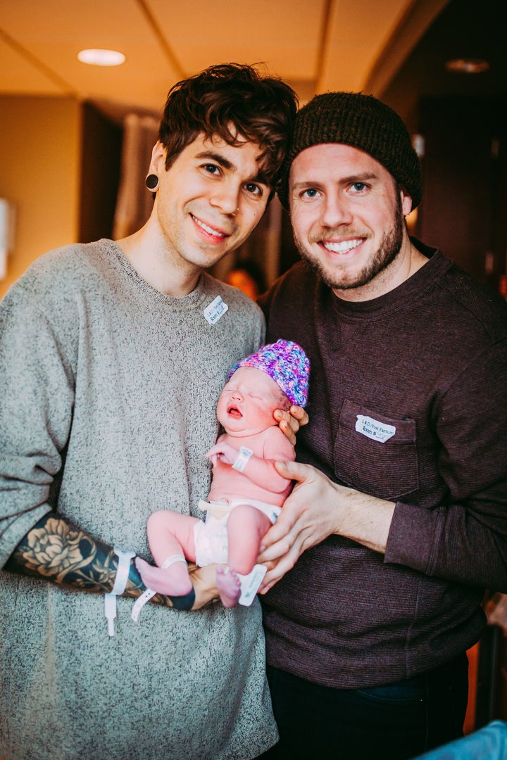 Matthew Eledge, Elliot Dougherty and baby Uma. 