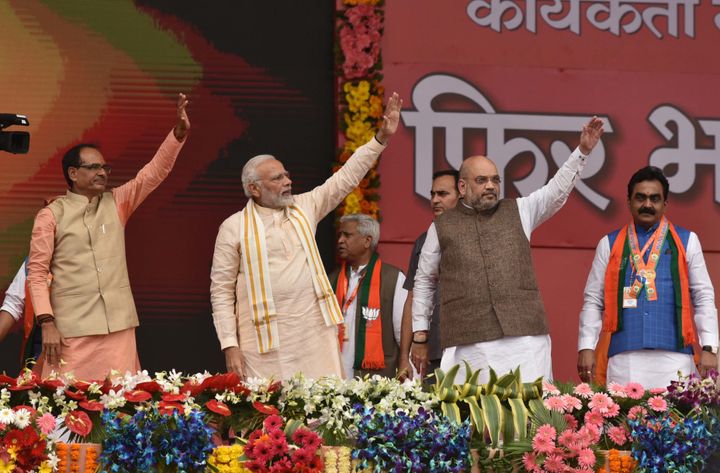 (From left) Former Madhya Pradesh CM Shivraj Singh Chouhan, Prime Minister Narendra Modi and BJP president Amit Shah at the September conclave in Bhopal that was called the "world’s largest cadre based convention of any political party" by the World Book of Records.