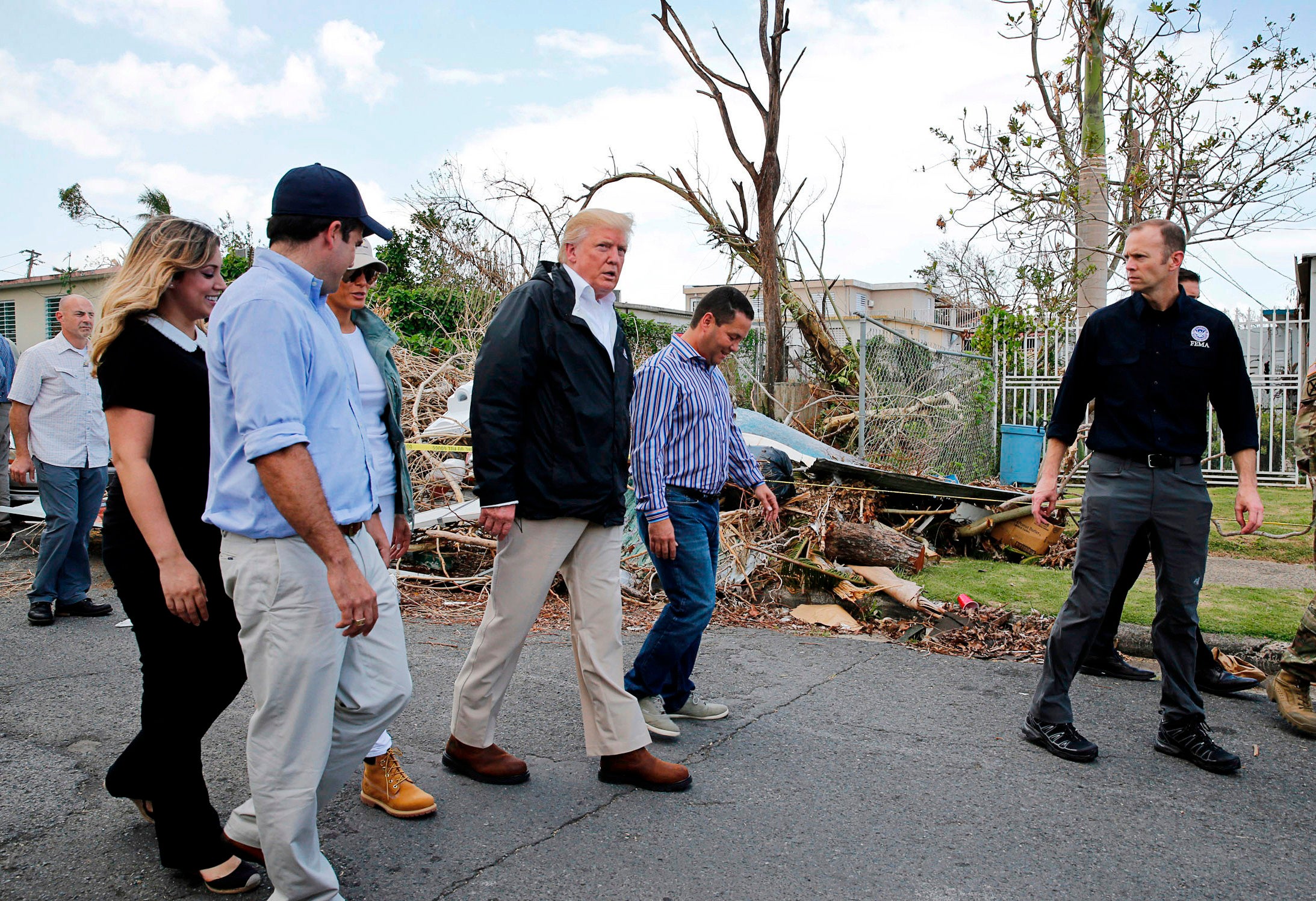 President Trump participates in a walking tour of areas damaged by Hurricane Maria in Guaynabo, Puerto Rico, Oct. 3, 2017. (Jonathan Ernst/Reuters)