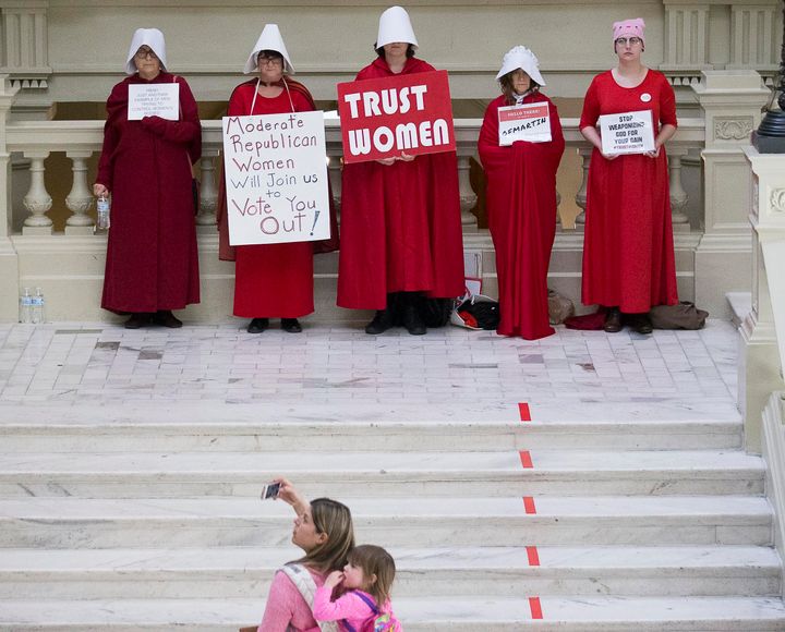 Pro-abortion rights demonstrators are seen in front of the Georgia Capitol in March. Georgia is among the states in which legislatures have passed more restrictive abortion laws this year, and Alabama may be looking at an almost complete ban of abortion.