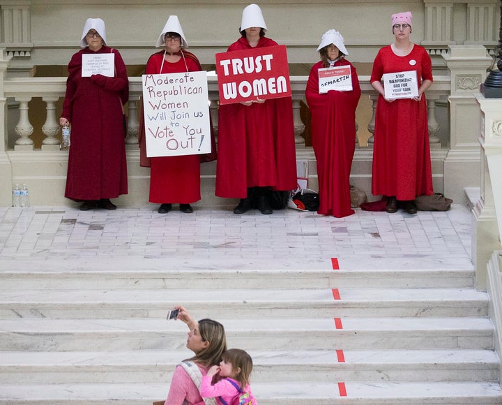 Pro-abortion rights demonstrators are seen in front of the Georgia Capitol in March. Georgia is among the states in which leg