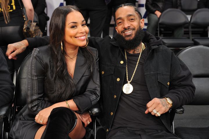 Lauren London and Nipsey Hussle at a Los Angeles Lakers game in November.