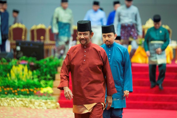 Brunei's Sultan Hassanal Bolkiah leaves after speaking at an event in Bandar Seri Begawan on 3 April.