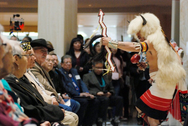 Raydean Johnson, of Zuni Pueblo, performs the buffalo dance at the New Mexico Statehouse on Feb. 1, a day dedicated to celebrations and recognition of the state's indigenous people.