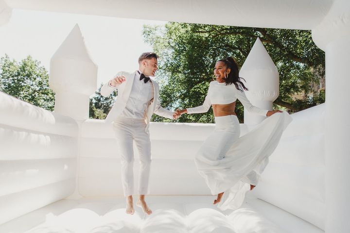 Couple Tiffany and Victor had a bouncy castle at their July 2017 wedding in Toronto. 