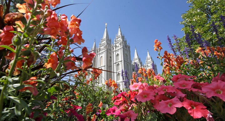 Flowers bloom in front of the Salt Lake Temple, at Temple Square, in Salt Lake City. 